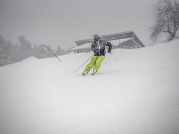 A Man Skiing on Snow